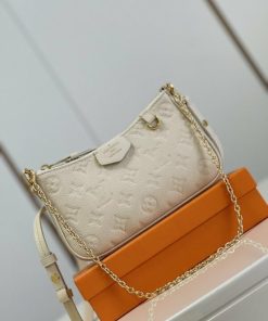 Shop Louis Vuitton MONOGRAM EMPREINTE Easy pouch on strap (M81066