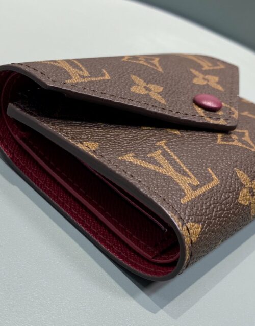 louis vuitton wallet with pink button